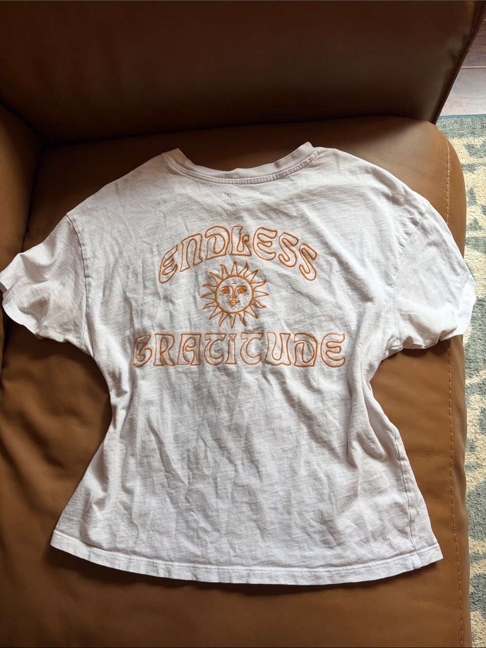 Cream T-Shirt with Orange 'Endless Gratitude' Sun Graphic